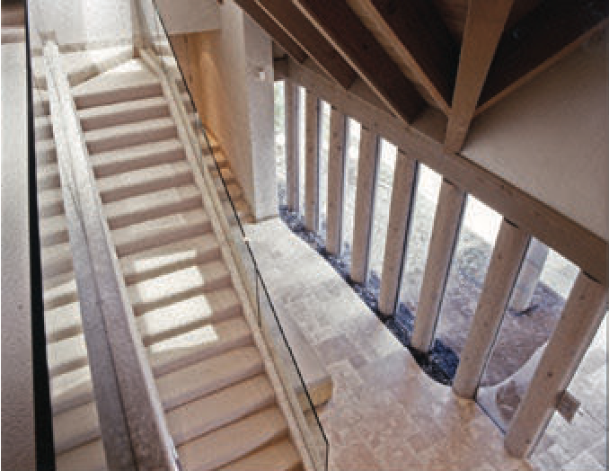 douglass residence Front entry walk with woven steel site wall